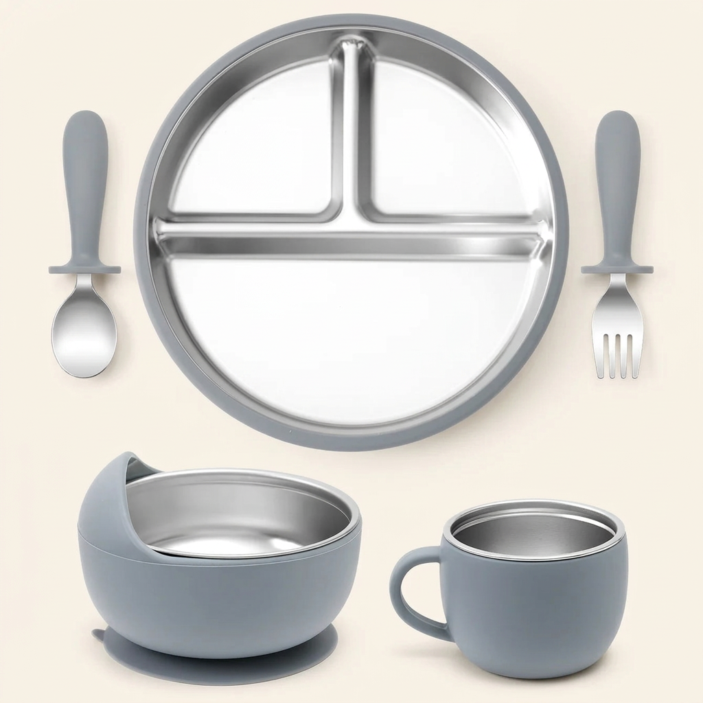 Pebble stainless steel and silicone baby feeding set on ivory