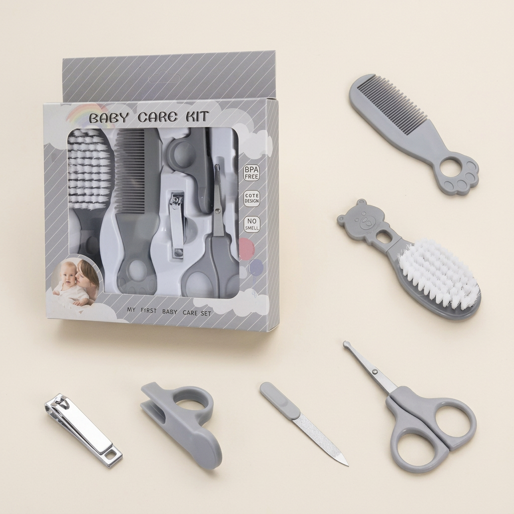 Grey baby grooming kit on a warm ivory background