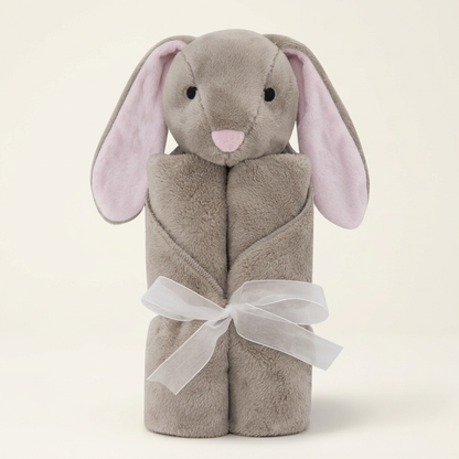 Taupe bunny baby blanket with white ribbon on an ivory background